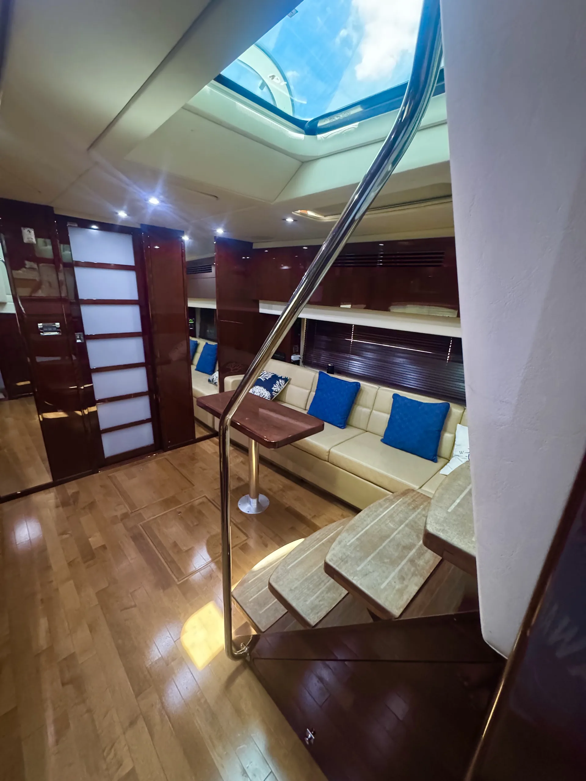 The salon settee beneath an open overhead hatch